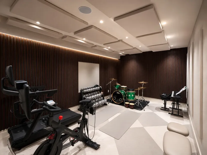 Home Gym/Music Room with Wood Slat Panels, Flush-Mount Ceiling Panels, and Fabri